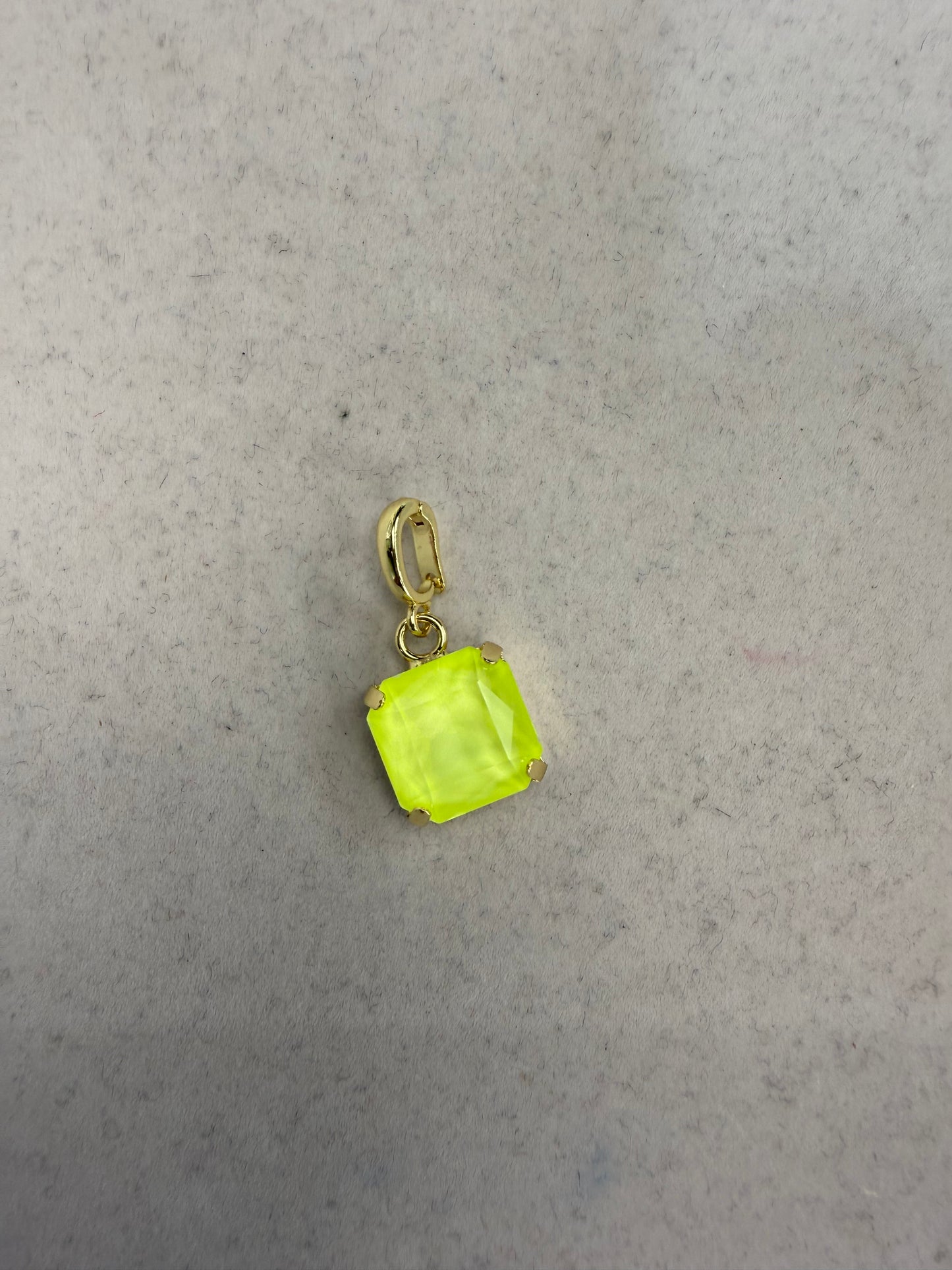 Neon yellow-green square faceted gemstone charm with gold prong setting and oval clasp bail by AF Designs