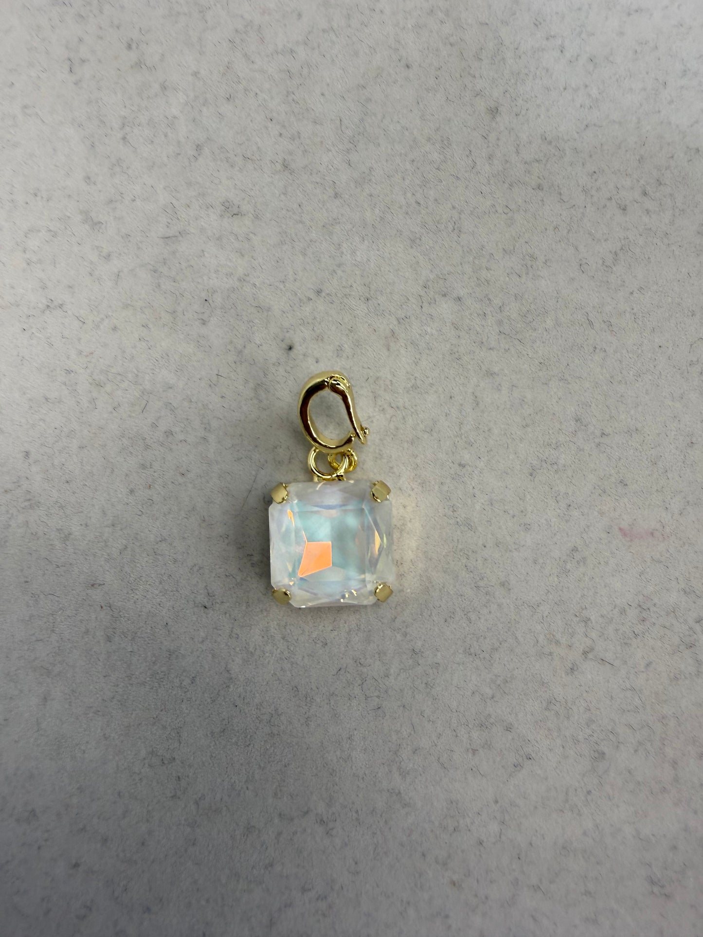 Square iridescent white crystal charm with gold prong setting and lobster claw clasp by AF Designs