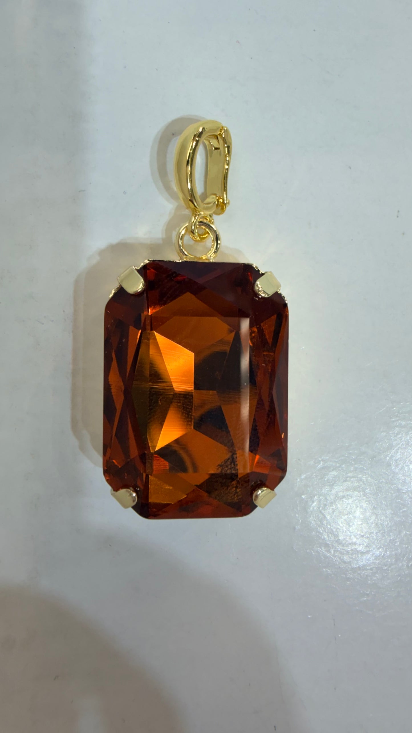 AF Designs rectangular cognac amber faceted gemstone charm pendant in gold-tone four-prong setting
