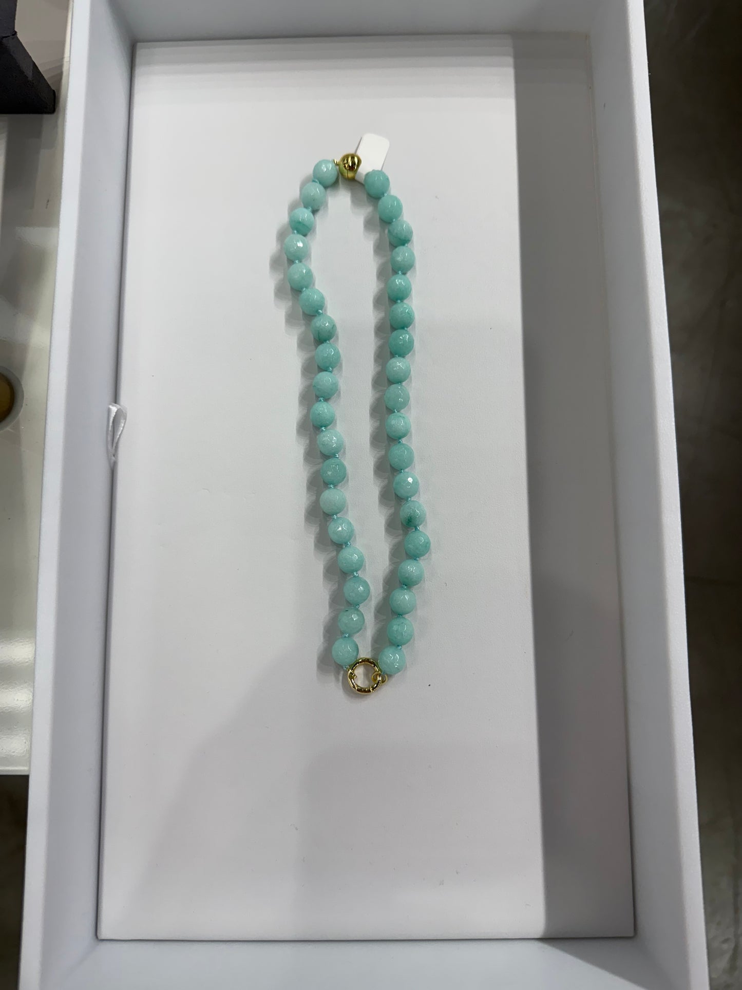 AF Designs 10MM light turquoise beaded necklace with gold-tone ring clasp, displayed in white jewelry box