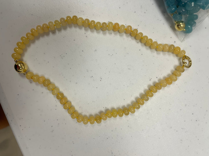 AF Designs Saltwater Stones Necklace with pale yellow rondelle beads and gold magnetic ball clasp closure