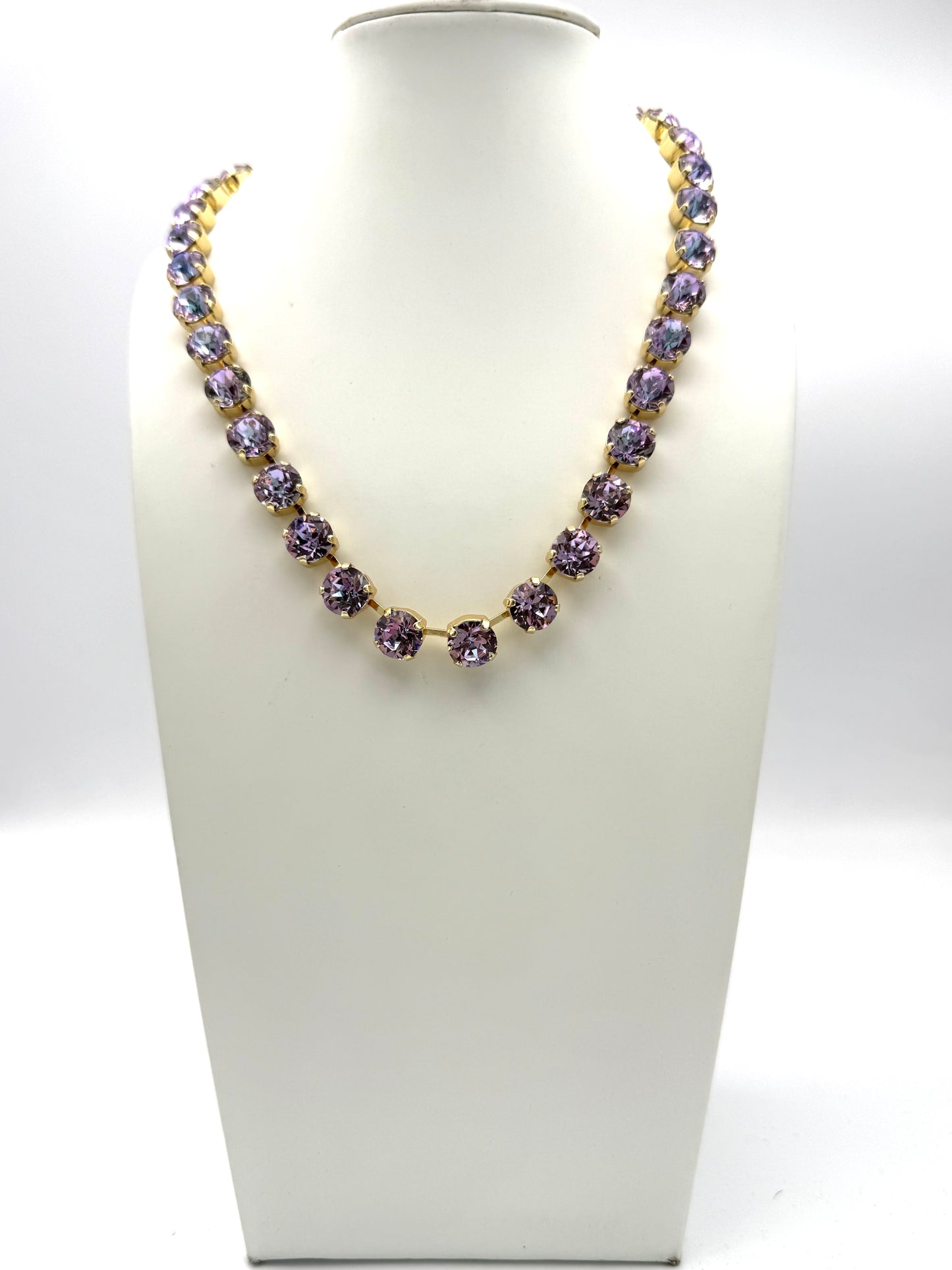 AF Designs Fifth Avenue Necklace featuring lavender round crystals in gold prong settings in a tennis-style design