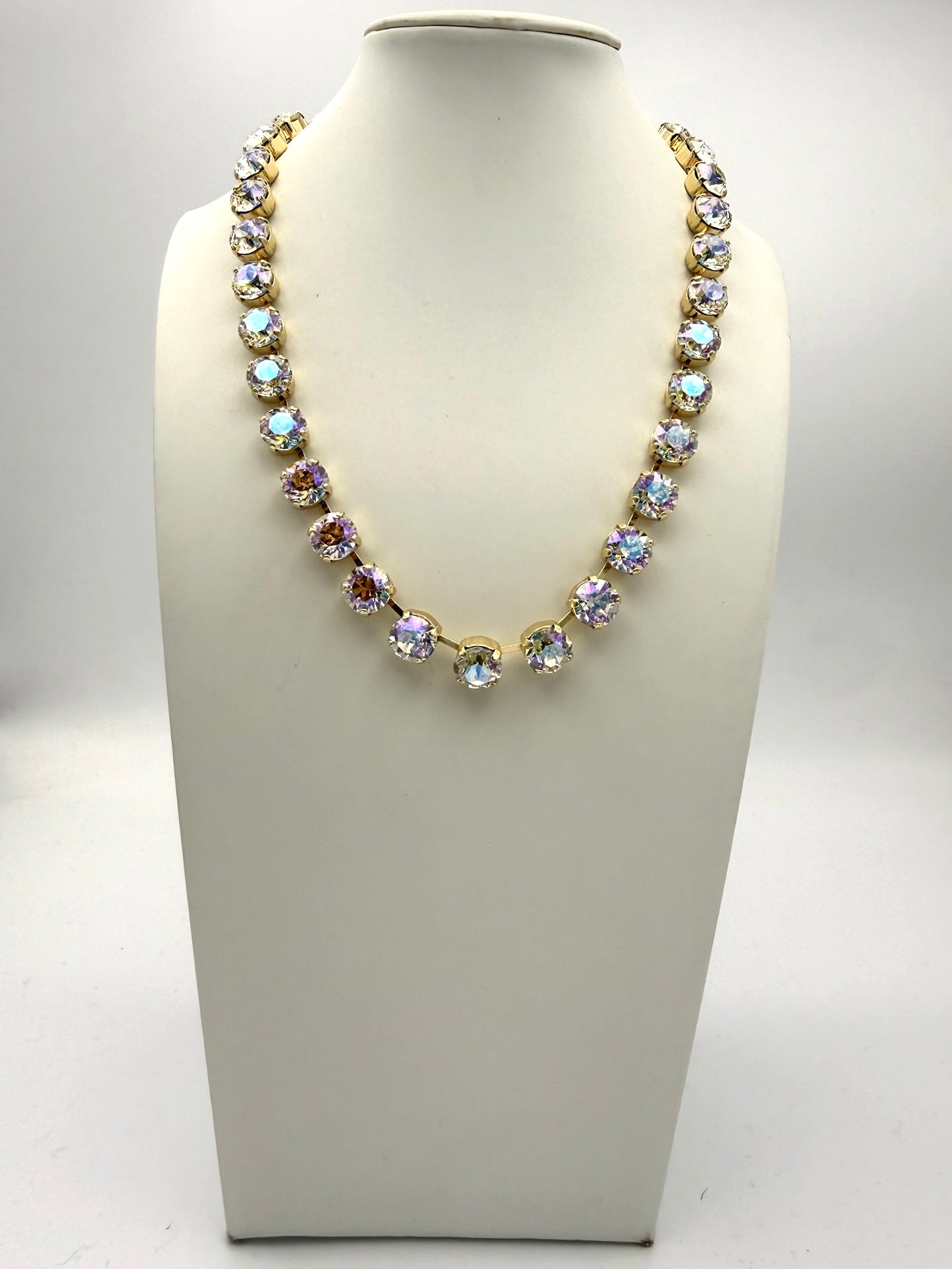 AF Designs Fifth Avenue gold collet necklace with iridescent AB crystal stones in continuous linked setting