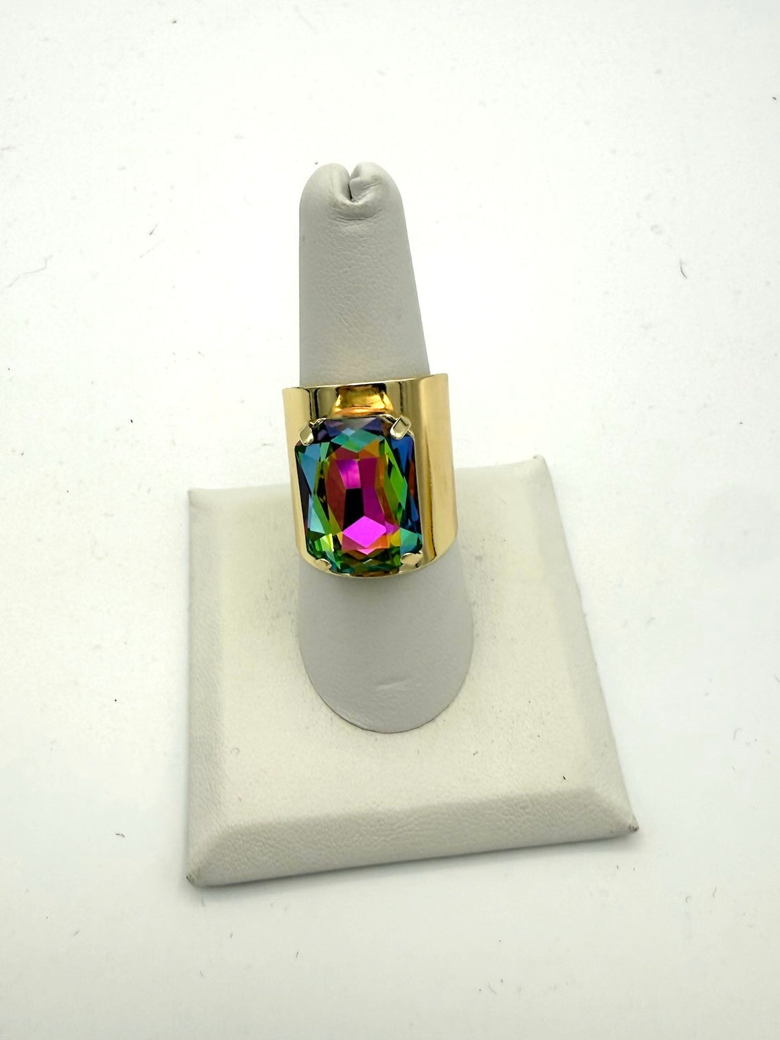 Gold wide-band statement ring with large iridescent rainbow cushion-cut crystal stone in mermaid finish