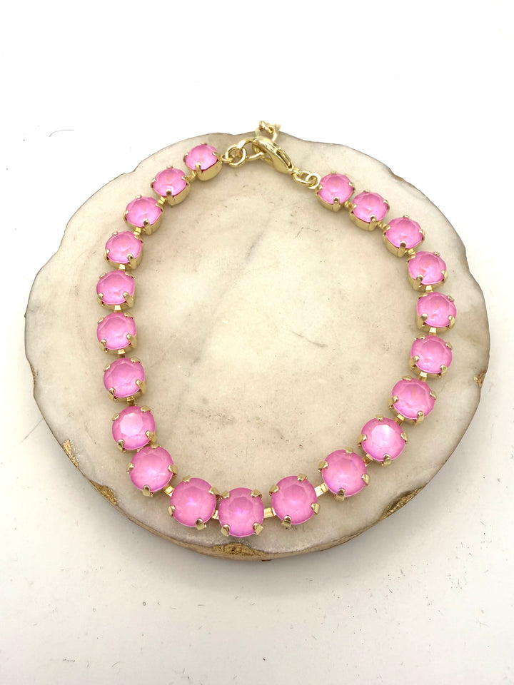 Gold tennis anklet with round bubblegum pink opal crystals and lobster clasp closure by AF Designs