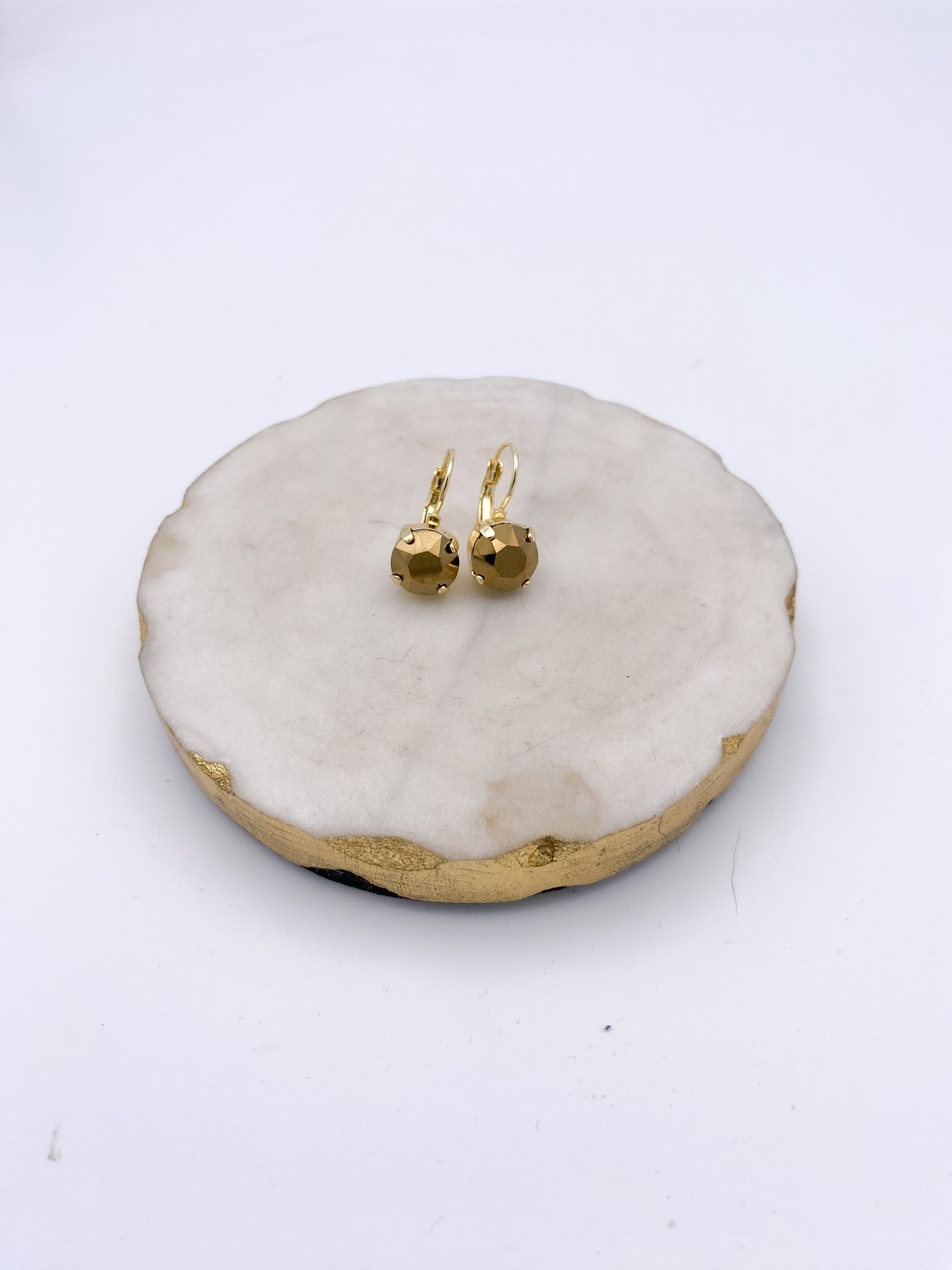 Gold lever-back drop earrings with faceted tiramisu bronze crystal stones in prong settings by AF Designs.