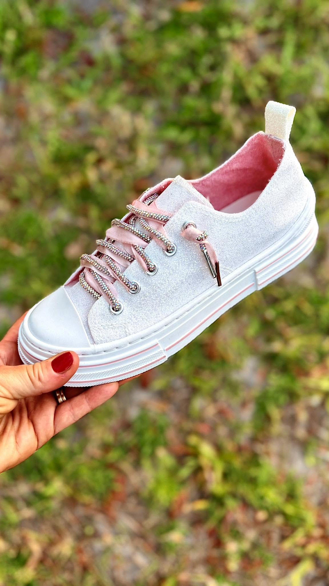 Very G white glitter low-top sneaker with rhinestone laces, pink satin ribbon ties, and pink interior lining