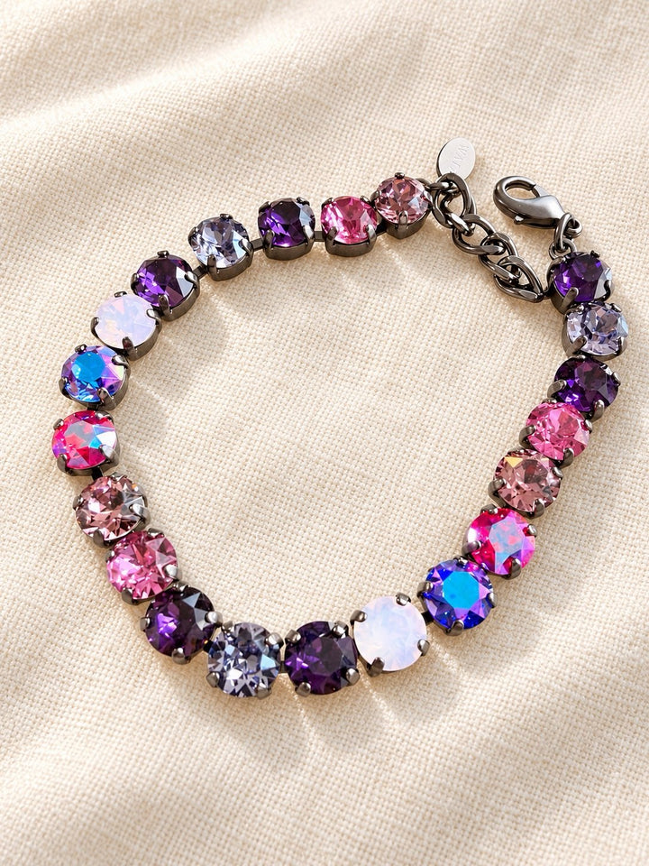 AF Designs Mood Swing crystal tennis bracelet in dark berry mix with purple, pink, and opal stones in gunmetal settings