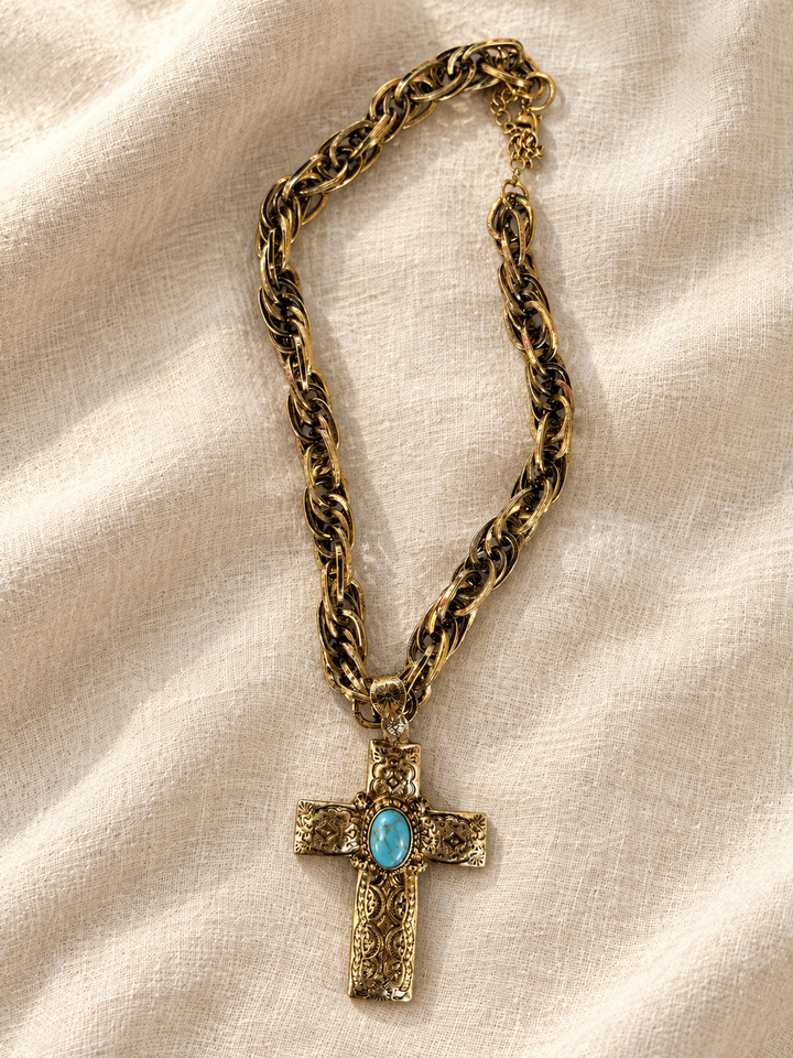 Antiqued gold chunky chain necklace with ornate engraved cross pendant and turquoise cabochon centerstone