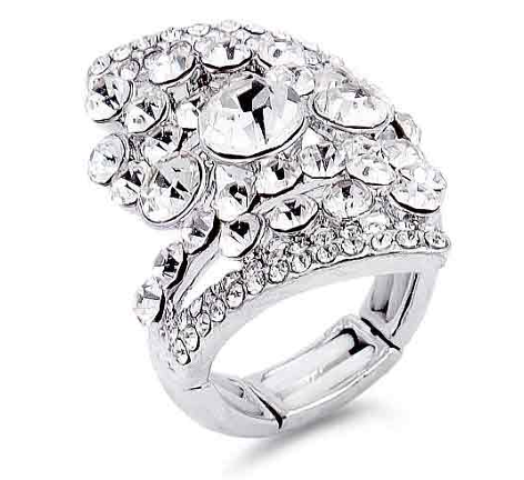 Rhodium plated stretch ring with tiered clear crystal dome design