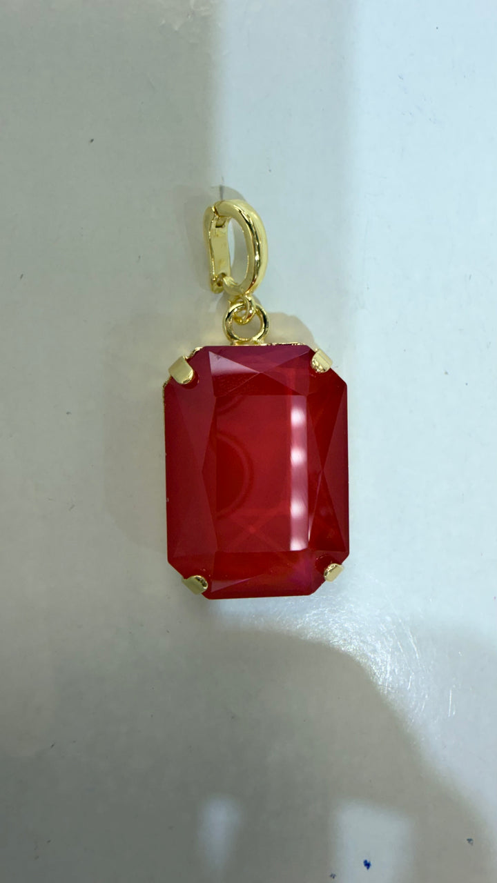 AF Designs rectangular cranberry red faceted gemstone charm pendant with gold-tone prong setting and spring clasp bail