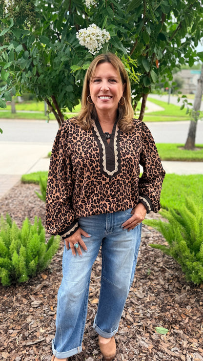 Jodifl Wild Card Top: flowy leopard print blouse with lace V-neck trim and billowy sleeves in camel and black
