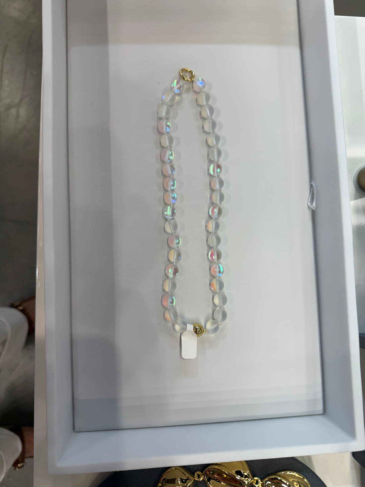 AF Designs 10mm clear iridescent beaded necklace with rainbow aurora finish and gold-tone clasp