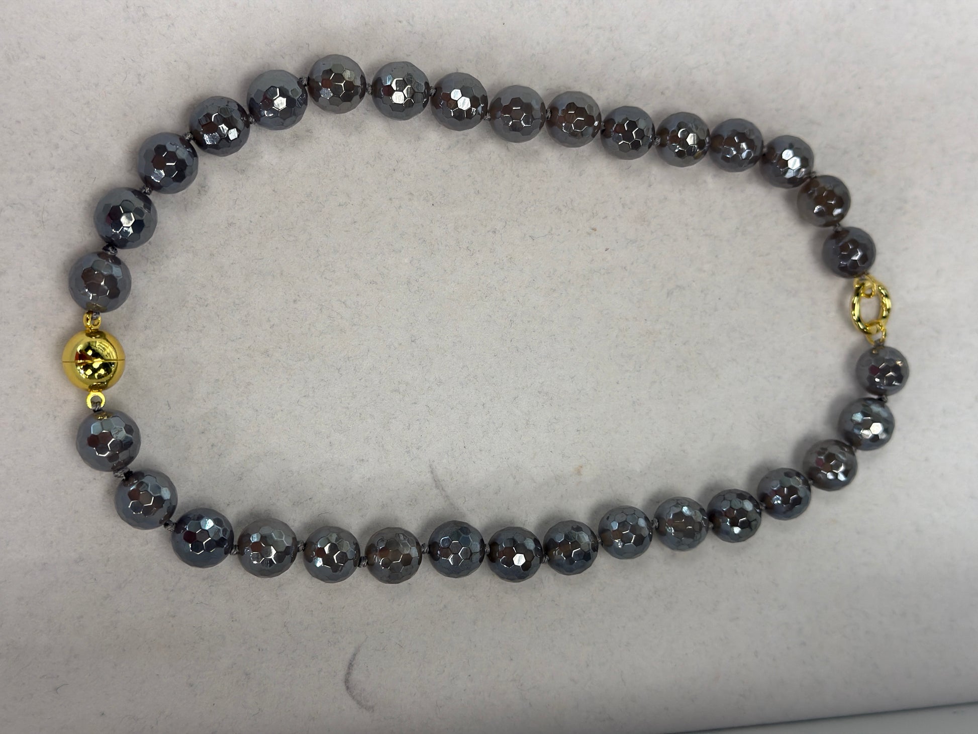 AF Designs 12MM faceted gray hematite beaded necklace with gold magnetic ball clasp, Love Bug Gray Skies