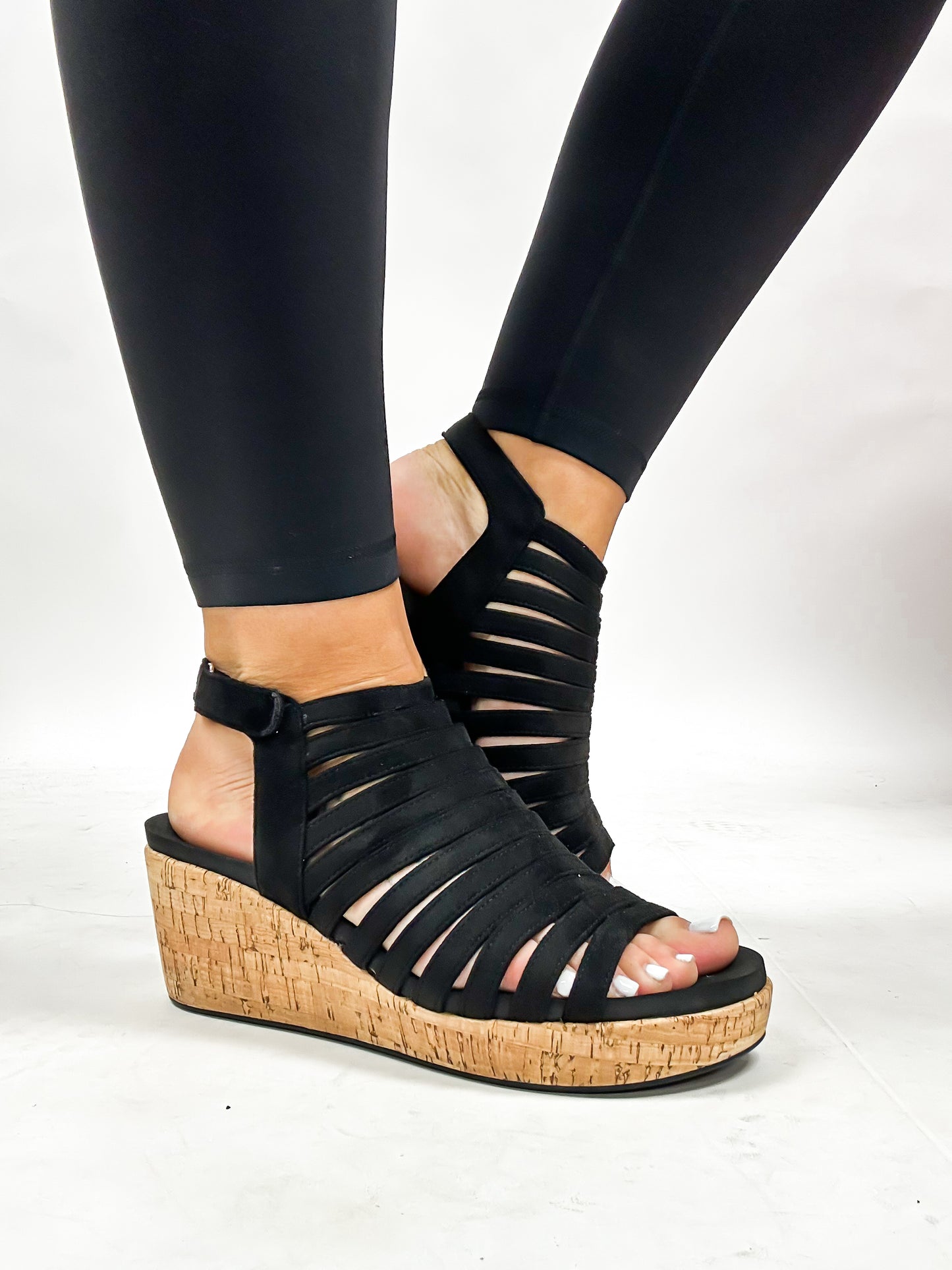 Corky's Black Faux Suede Oopsie Daisey Sandals