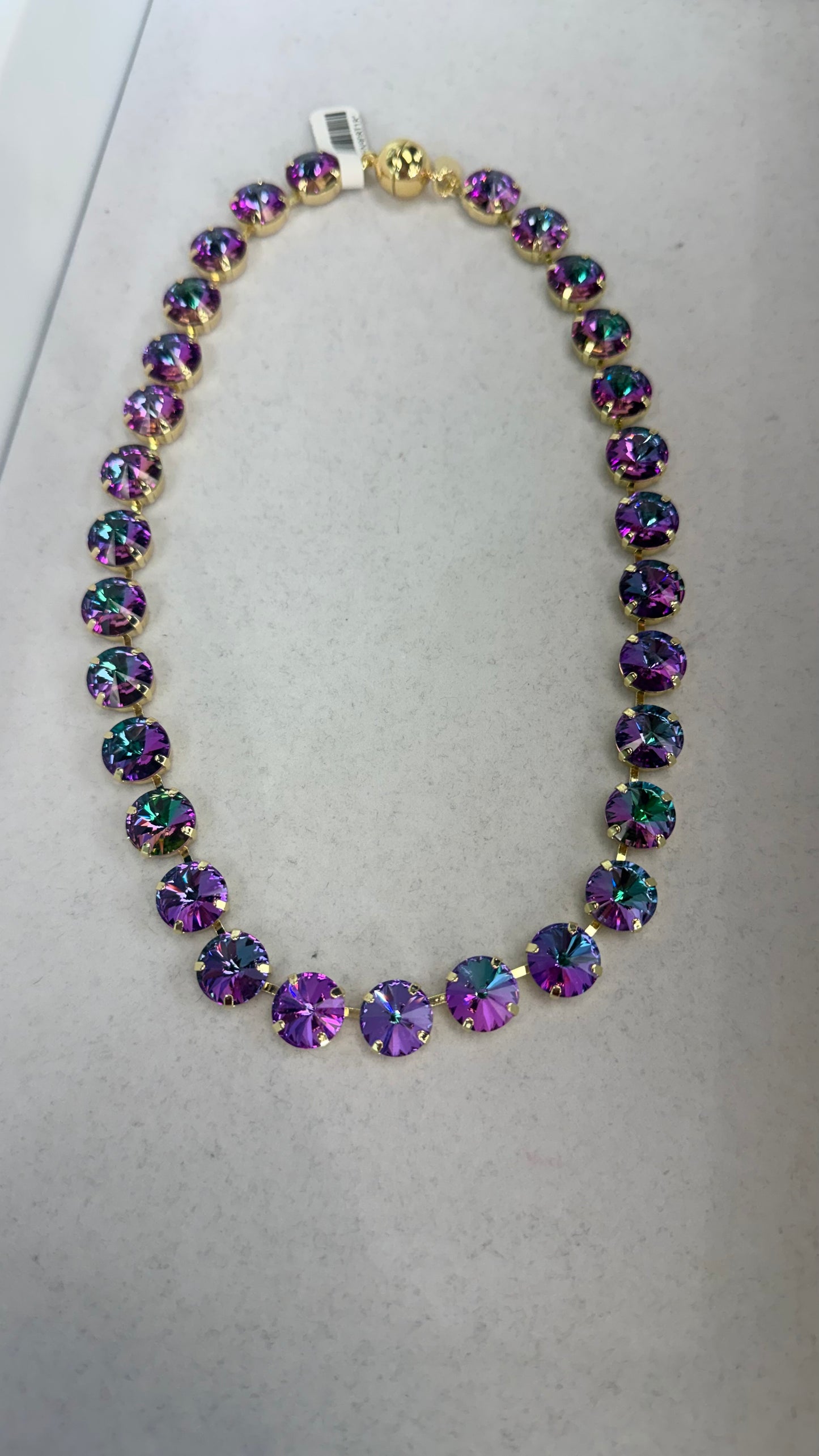 AF Designs gold-tone statement necklace with iridescent purple teal rivoli crystals in prong settings