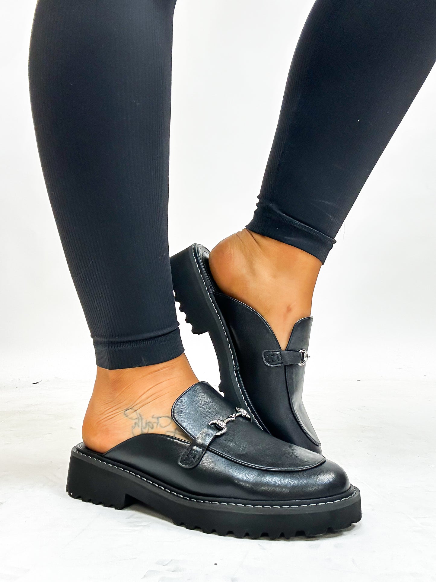 Chaussures Wingin It noires et lisses de Corky