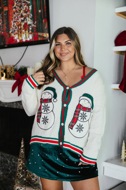 Snow Much Fun Cardigan by Grace + Emma, cable-knit cardigan with snowman embroidery and candy-cane trim