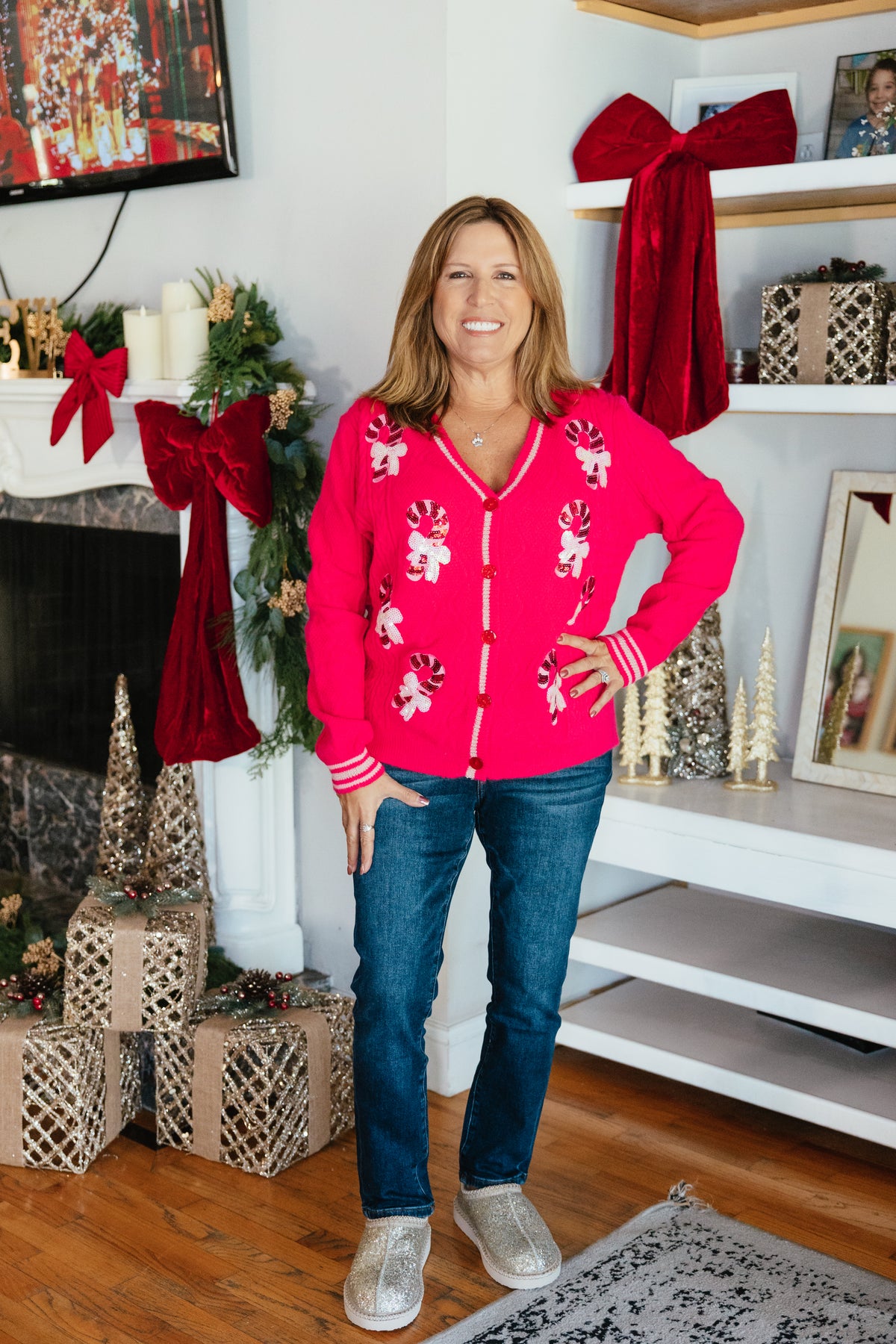 Sweetest Christmas Cardigan by Grace + Emma, hot pink cable-knit cardigan with sequin candy canes and bows