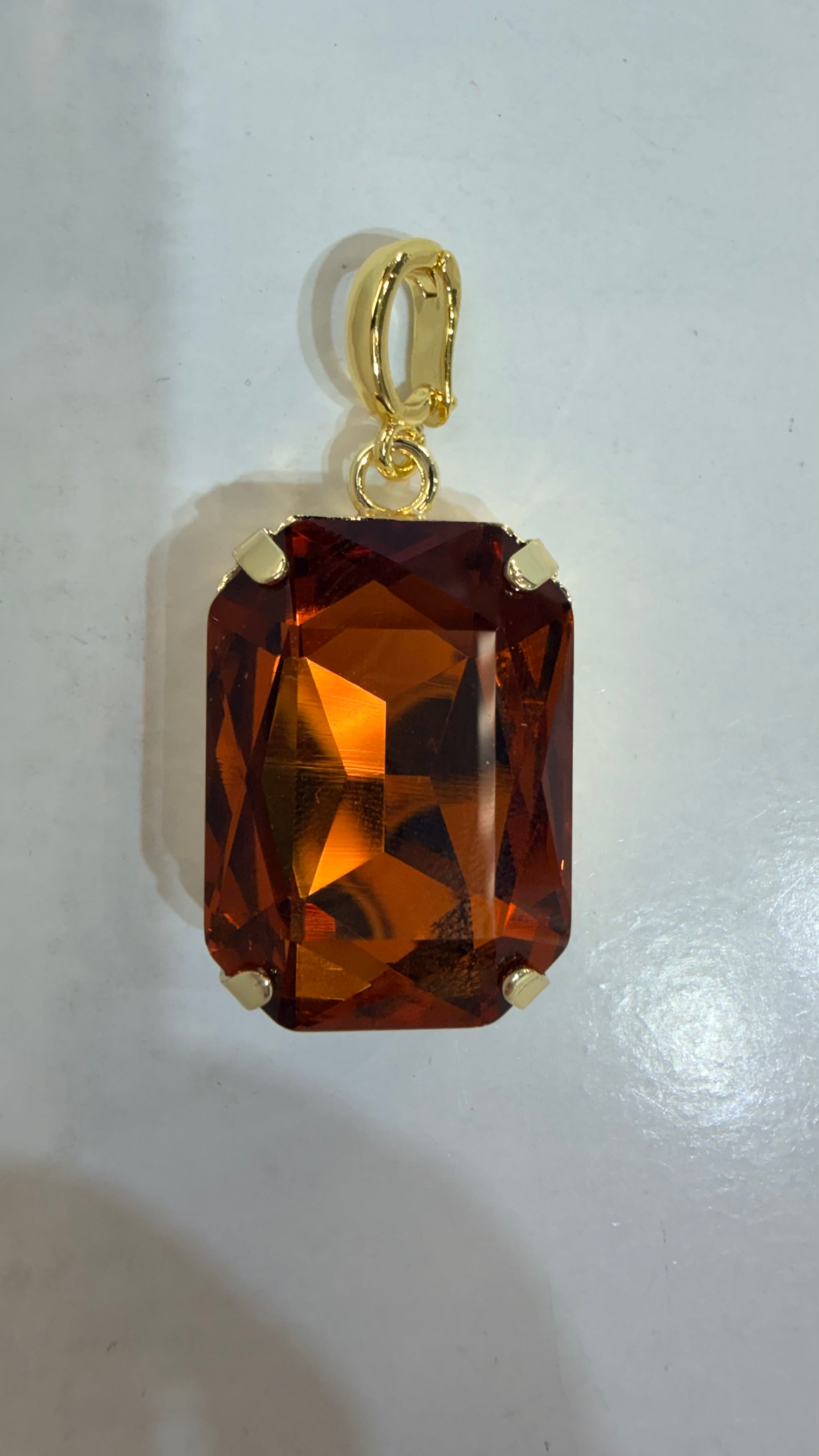 AF Designs rectangular cognac amber faceted gemstone charm pendant in gold-tone four-prong setting