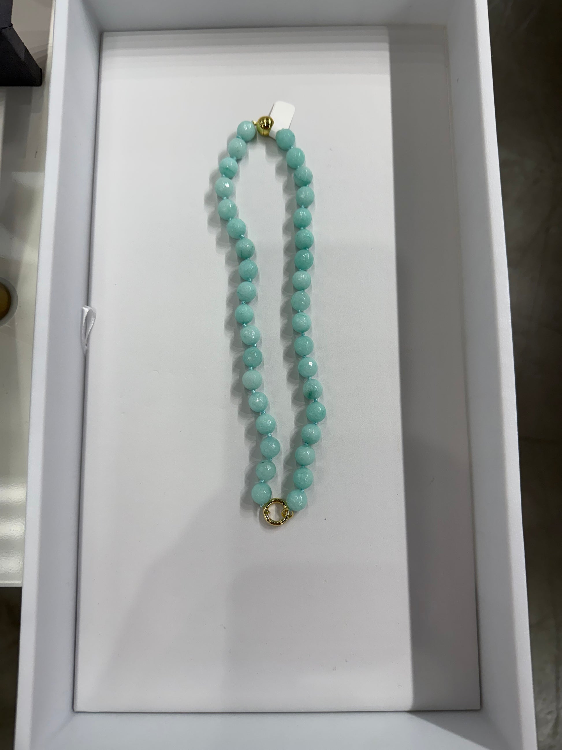 AF Designs 10MM light turquoise beaded necklace with gold-tone ring clasp, displayed in white jewelry box