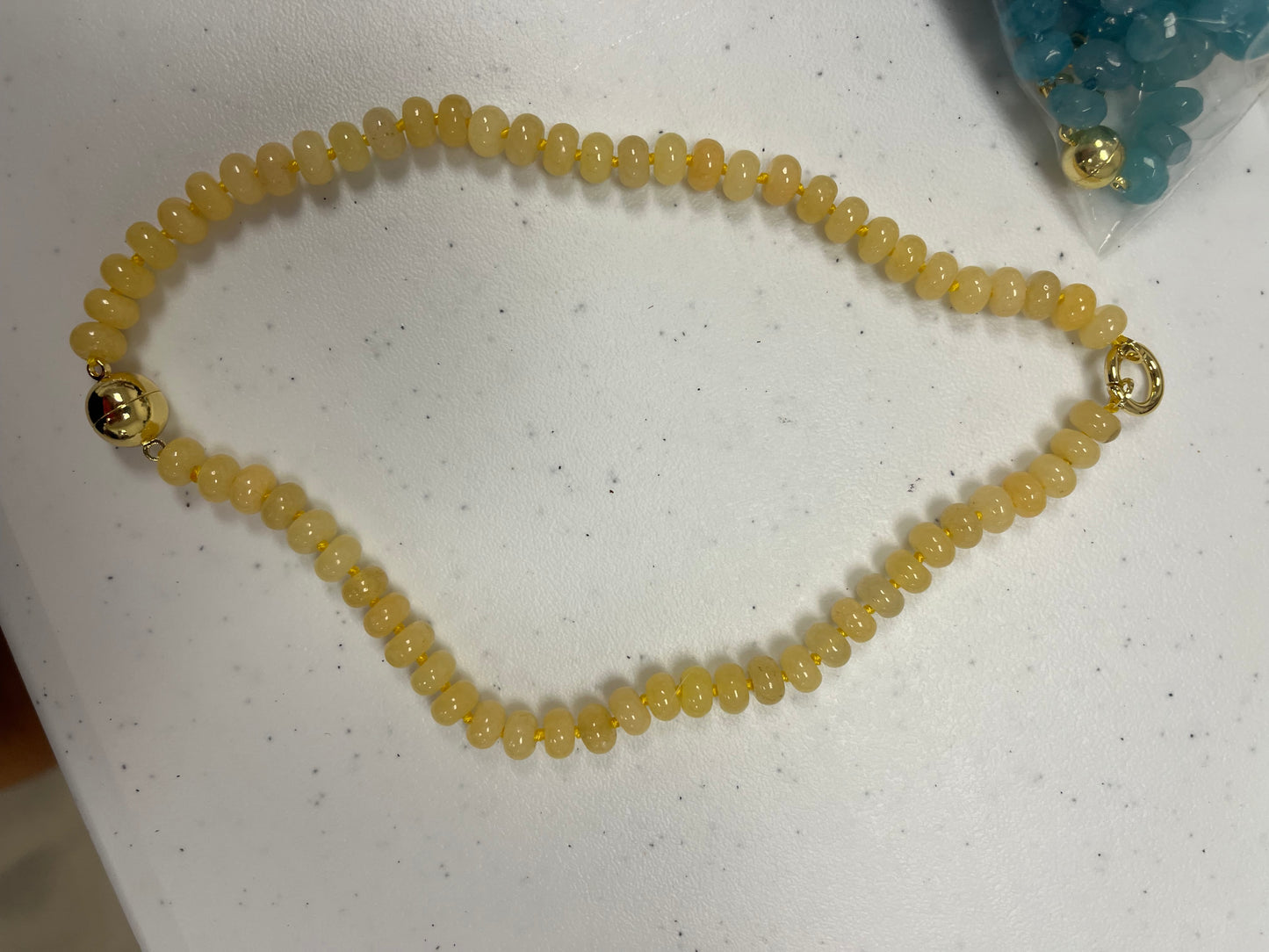AF Designs Saltwater Stones Necklace with pale yellow rondelle beads and gold magnetic ball clasp closure