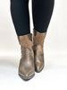 Les belles bottes en bronze de Corky