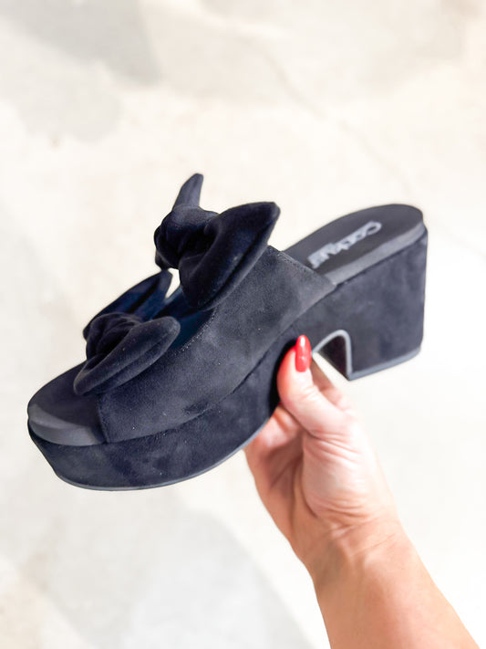 Presale: Corky's Black Faux Suede Put A Bow On It Sandals