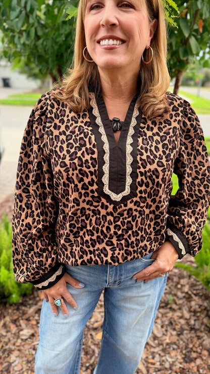 Jodifl Wild Card Top: leopard print blouse with cream lace V-neck bib detail and puff sleeves