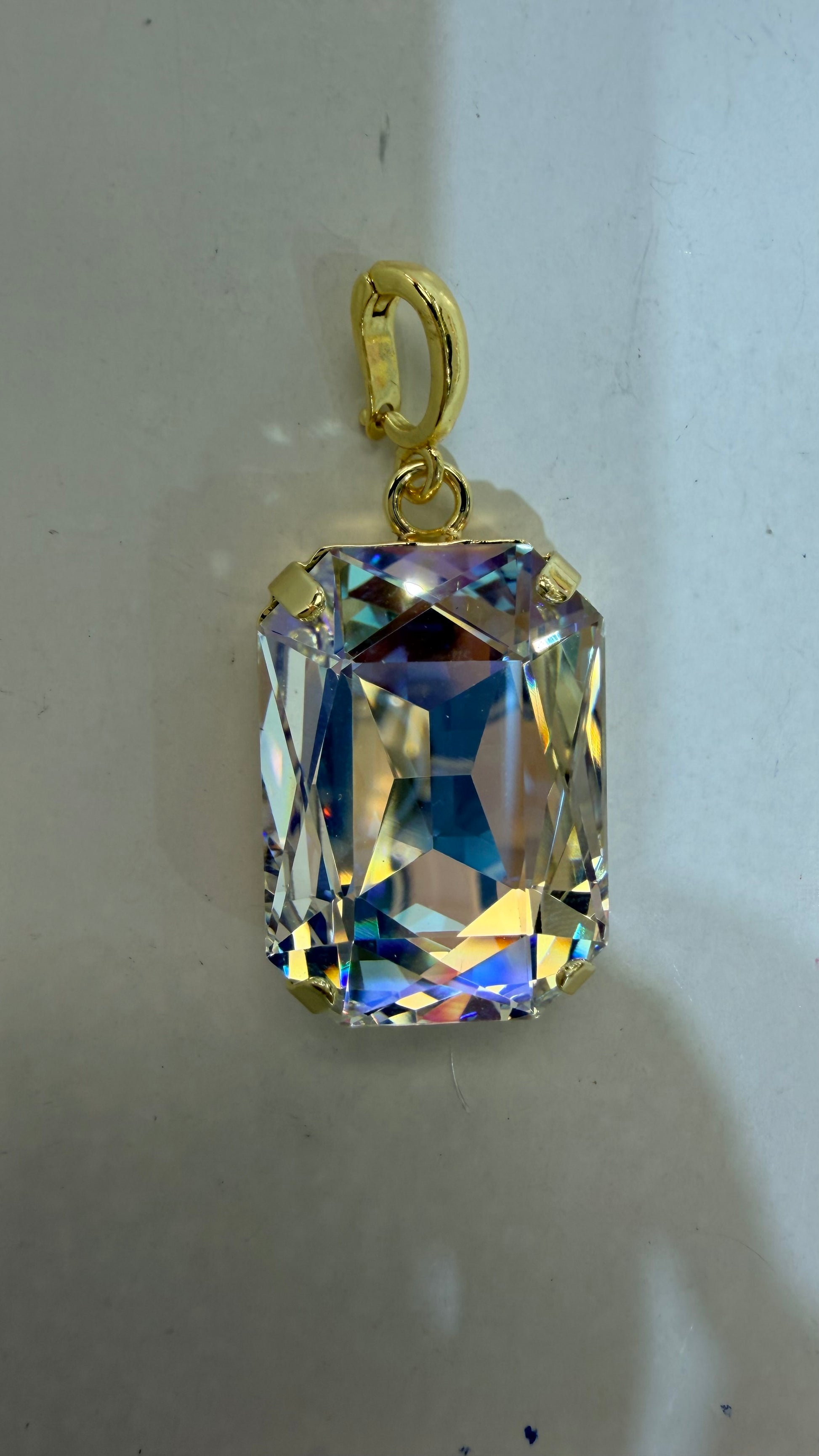Large rectangular AB crystal pendant charm in gold-tone prong setting with rainbow iridescent facets by AF Designs
