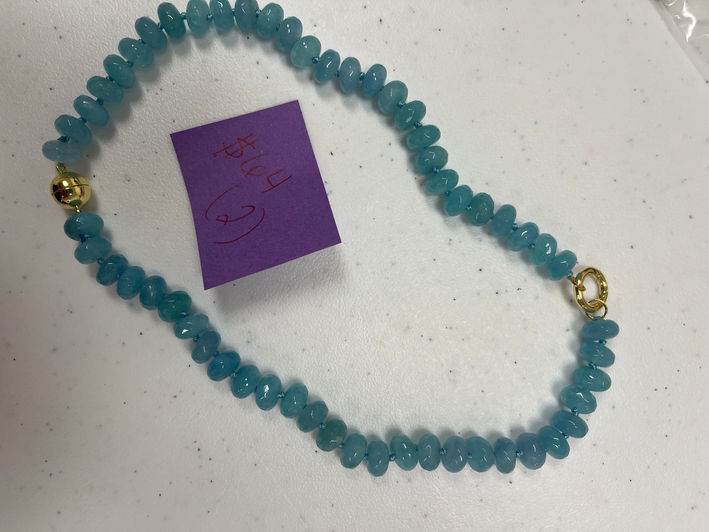 AF Designs aqua blue rondelle bead strand necklace with gold-tone clasp and knotted cord detailing