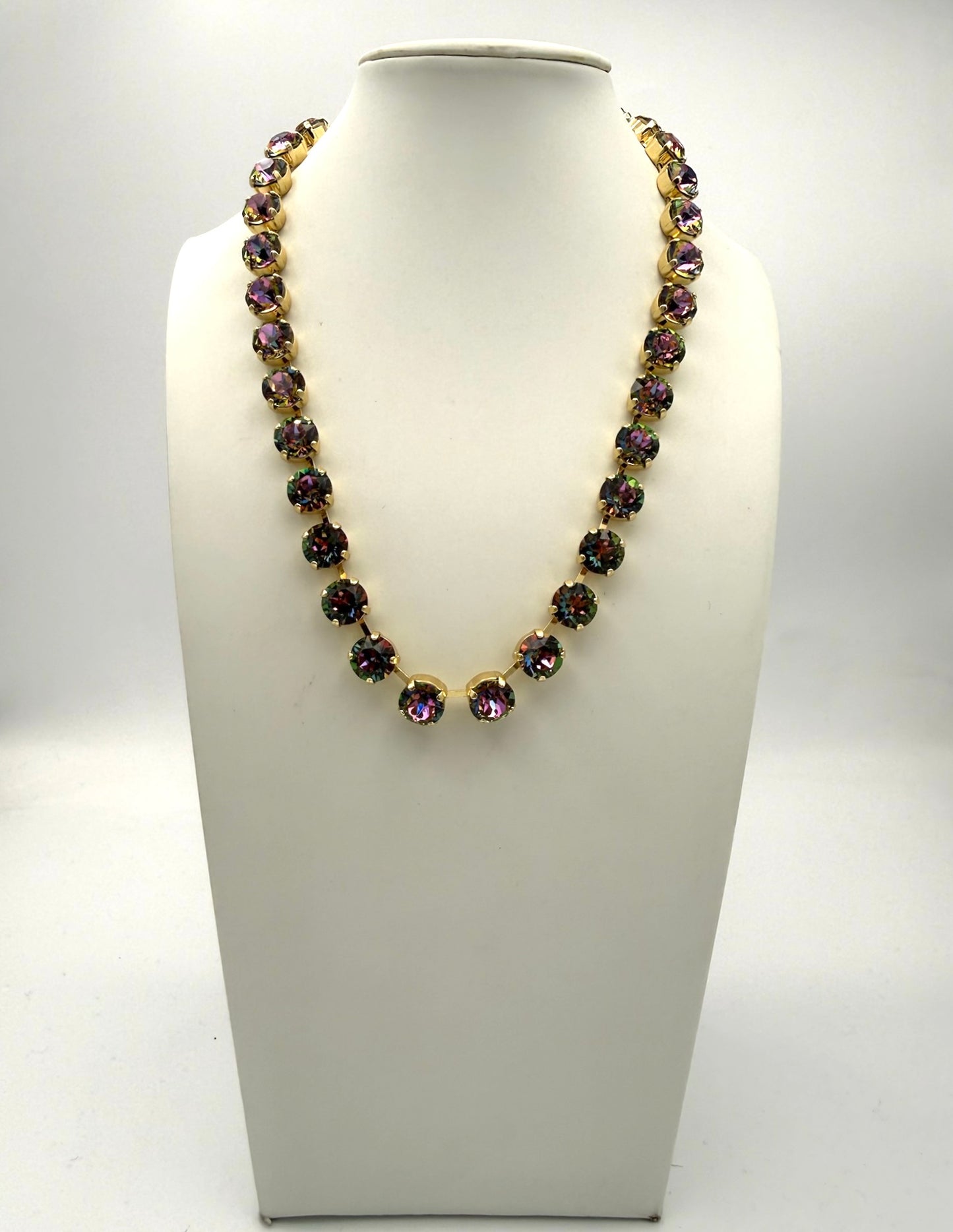 AF Designs Fifth Avenue gold-tone necklace with iridescent purple volcano faceted crystal stones, collar length