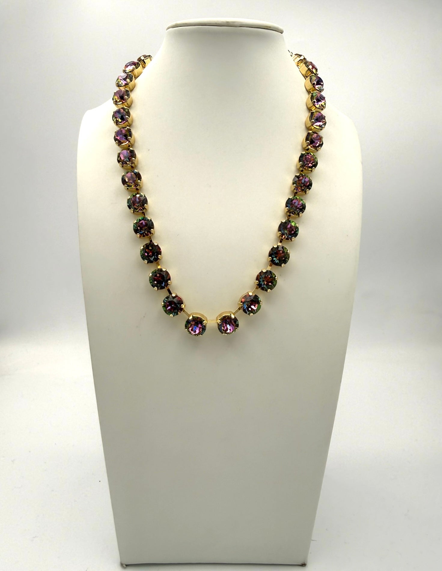 AF Designs Fifth Avenue gold-tone necklace with iridescent purple volcano faceted crystal stones, collar length