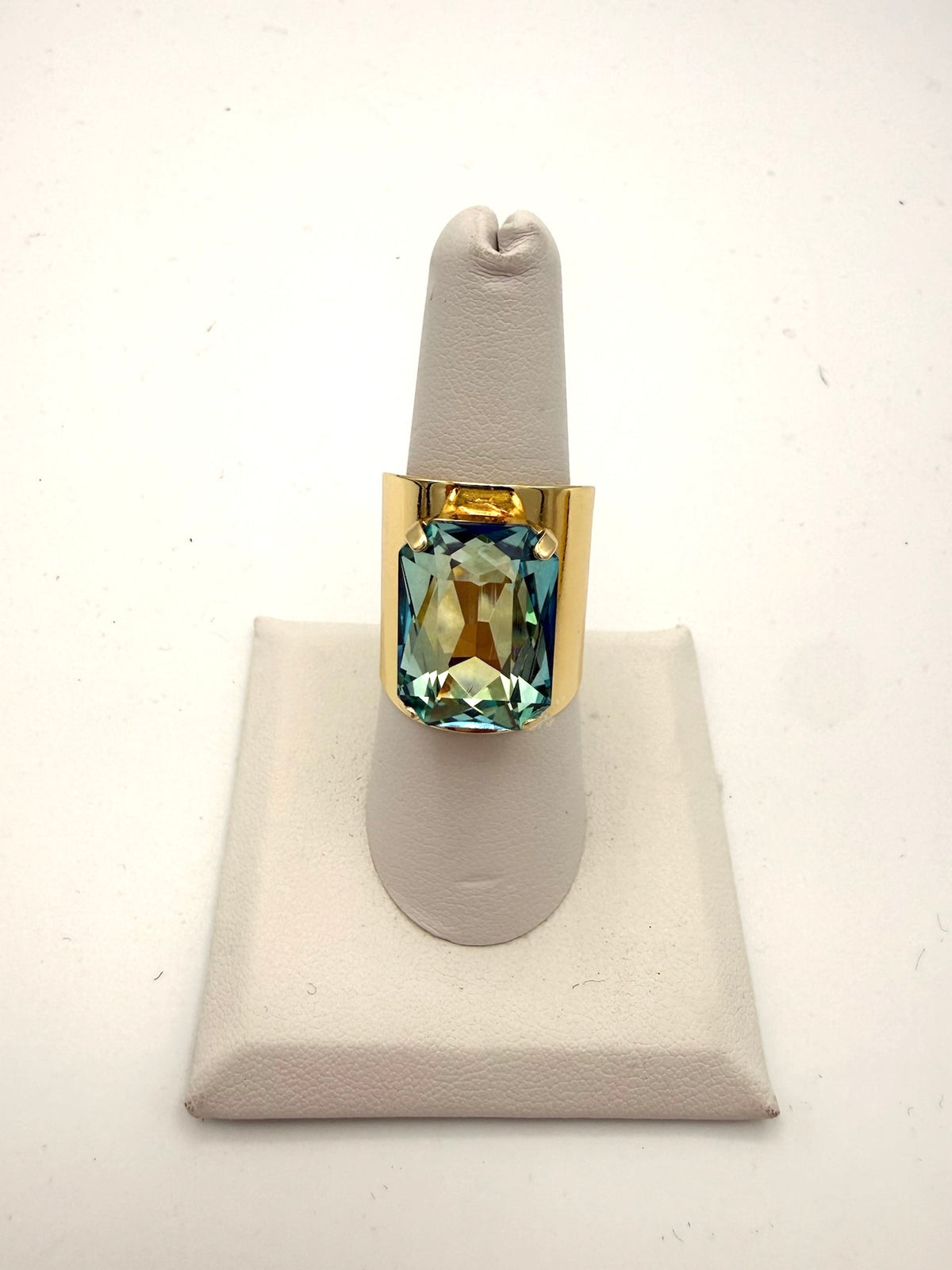 Bold aqua cushion-cut gemstone cocktail ring with wide polished gold band by AF Designs
