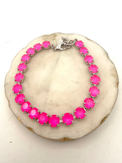 AF Designs tennis anklet with neon hot pink faceted crystals in silver prong settings with lobster clasp