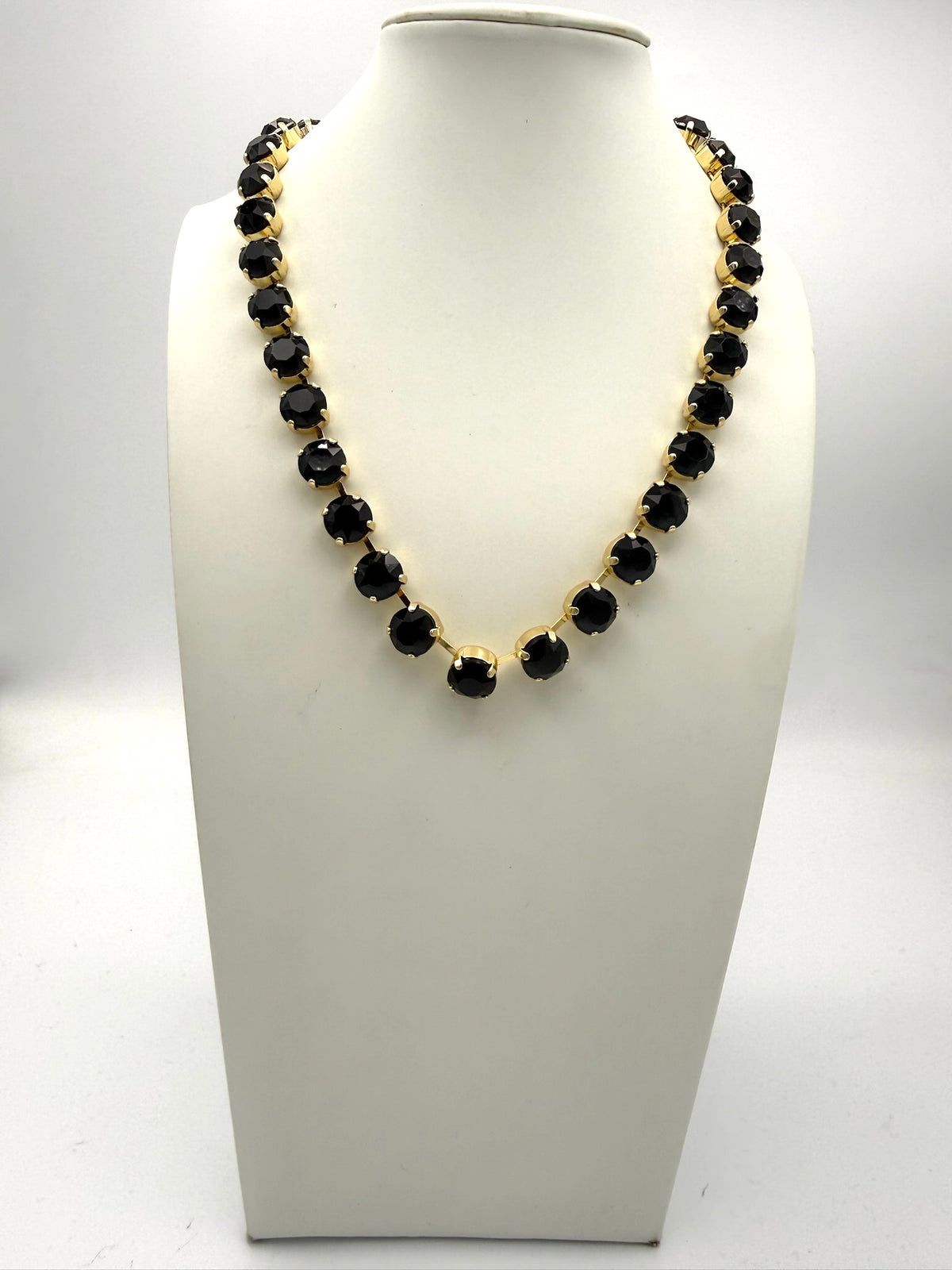 AF Designs Fifth Avenue gold-tone necklace with large round faceted black crystal stones in prong settings