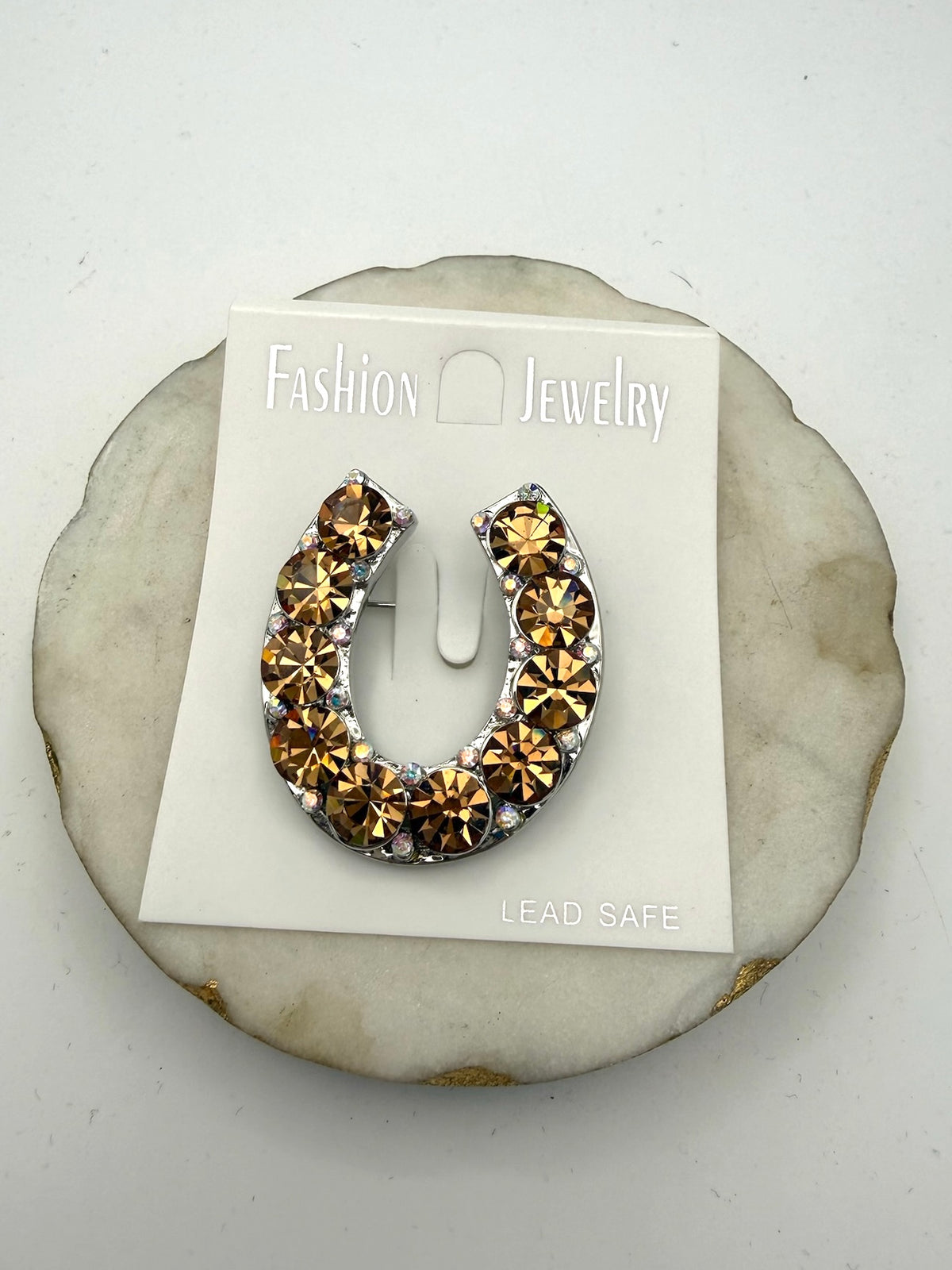 Horseshoe Brooch In Light Topaz