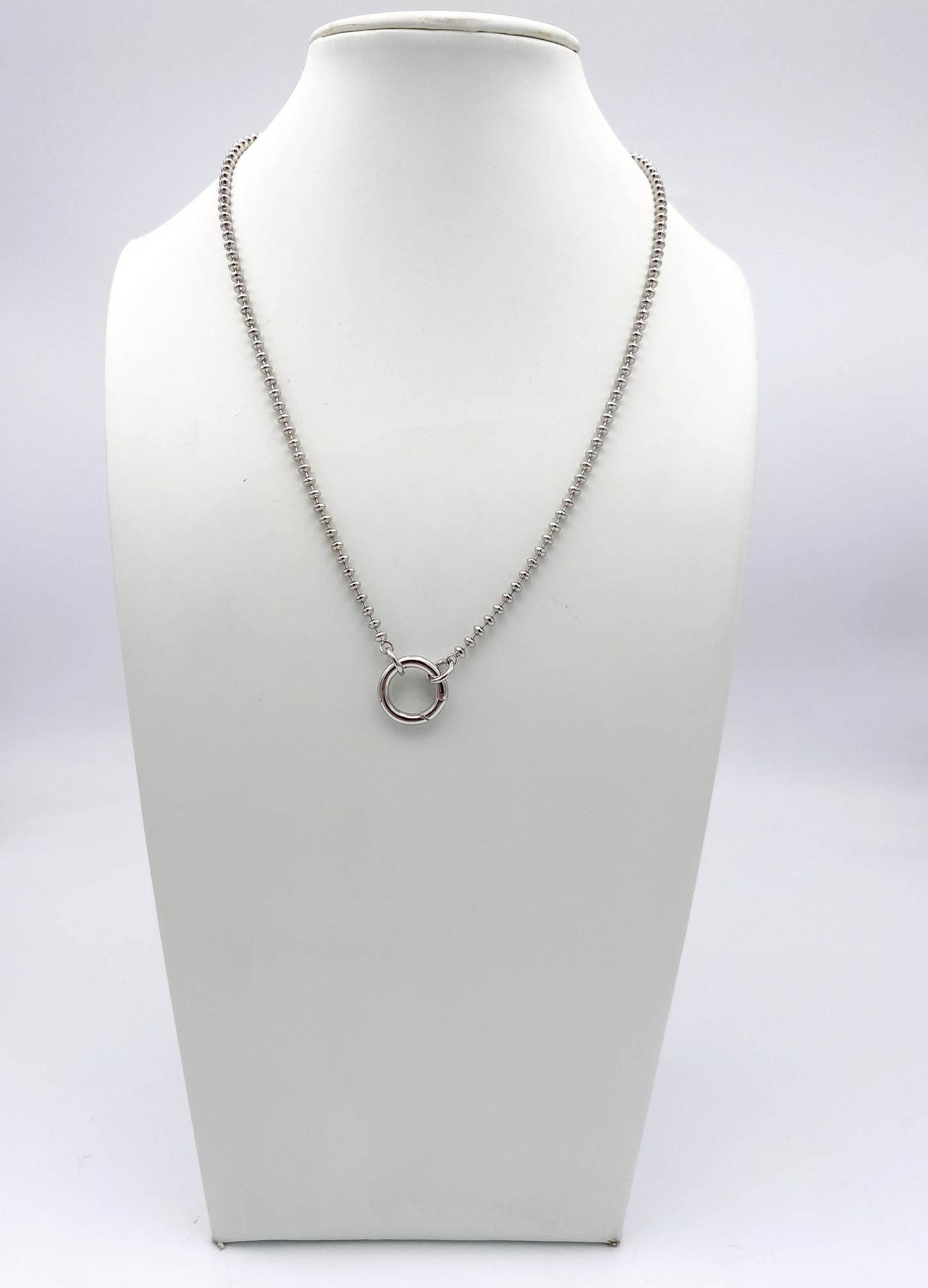 AF Designs silver ball chain necklace with circular spring ring center pendant on white jewelry bust