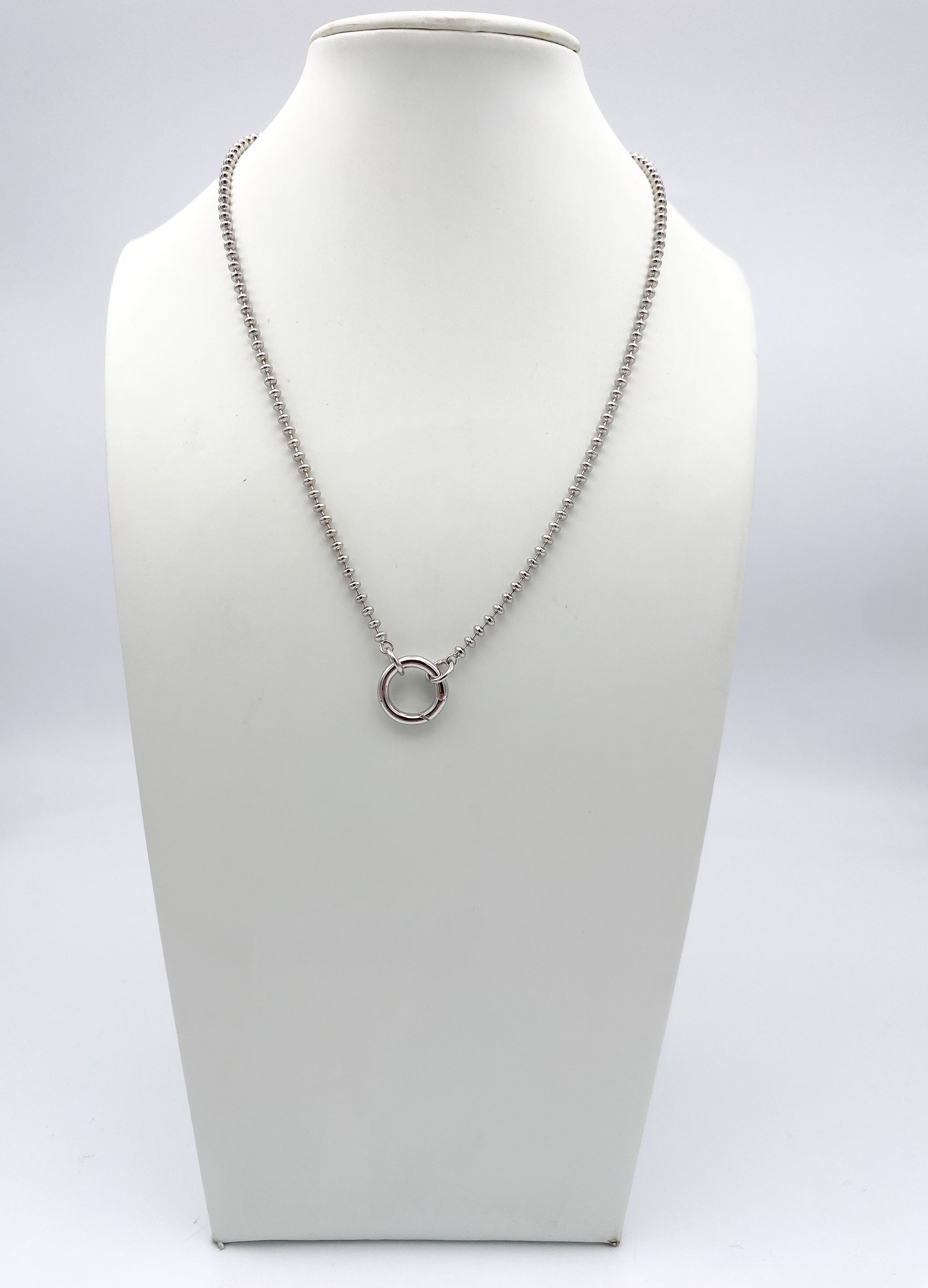 AF Designs silver ball chain necklace with circular spring ring center pendant on white jewelry bust