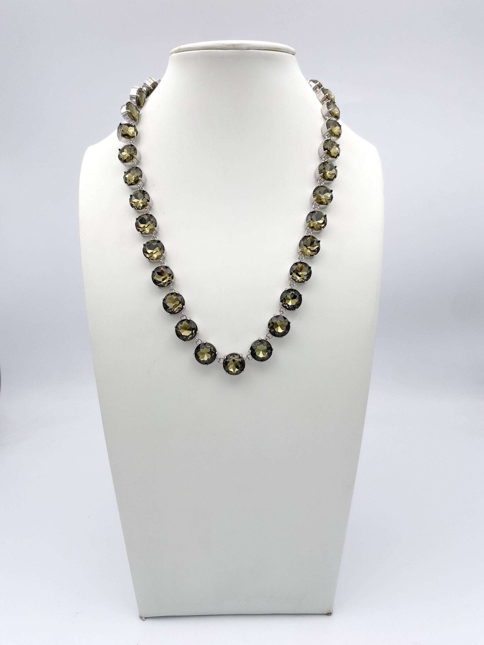 AF Designs Making Moves rivière necklace with smokey gray faceted crystals in silver settings on white bust