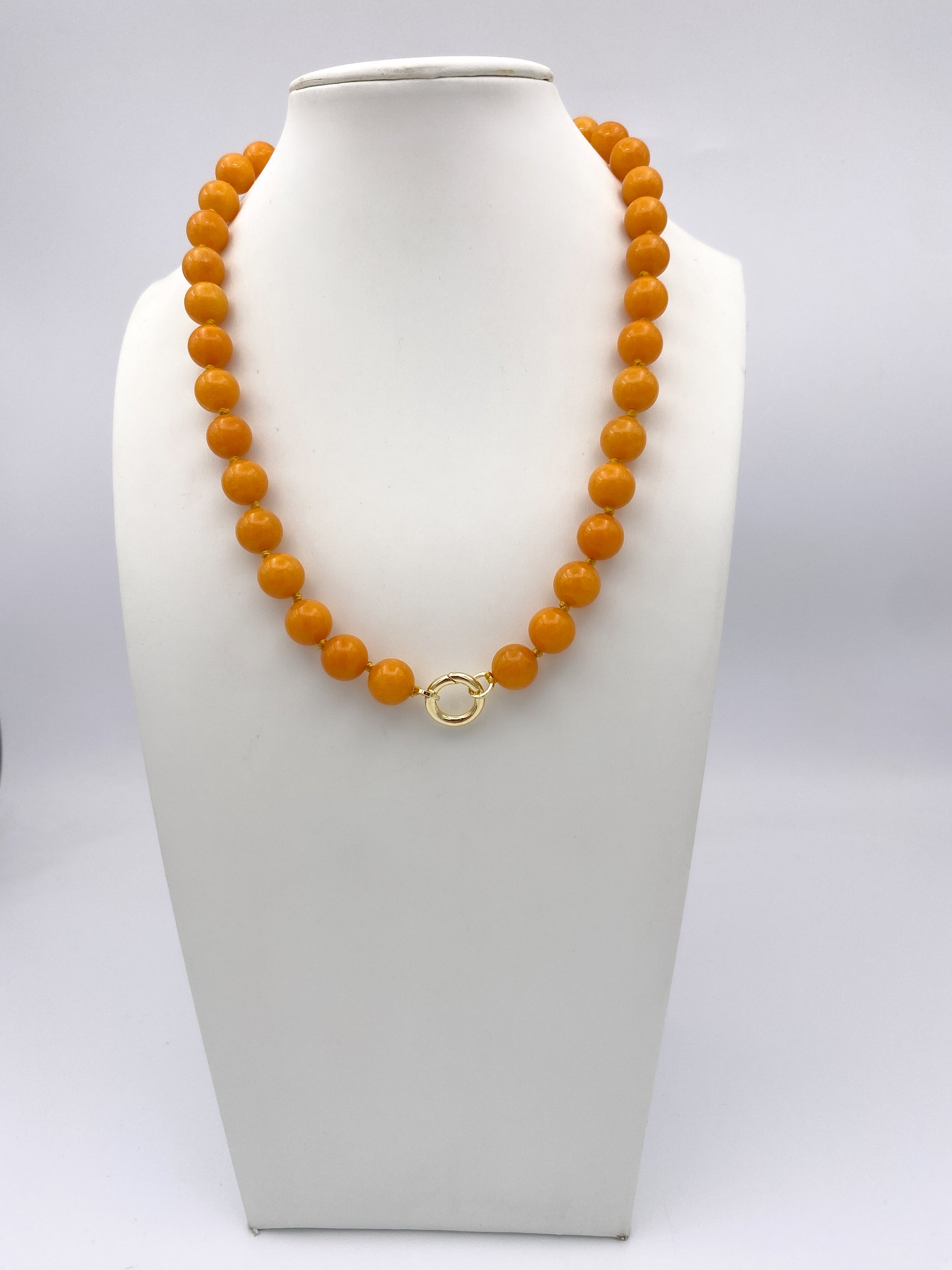 AF Designs Marigold Sunshine Necklace: single-strand orange beads with gold spacers and circular gold clasp