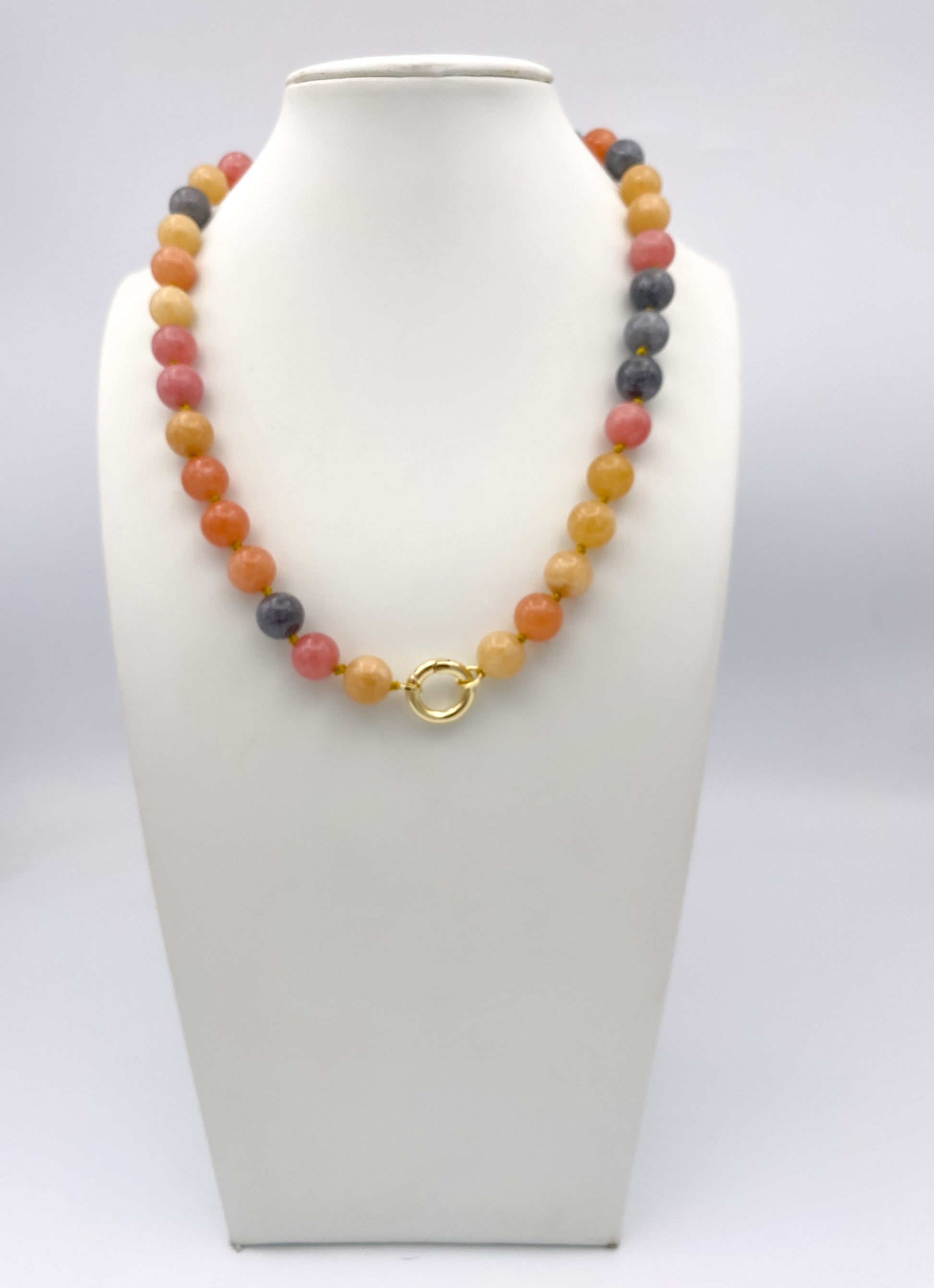 AF Designs Sunset Sorbet beaded necklace with peach, coral, yellow, and gray gemstone beads and gold ring clasp