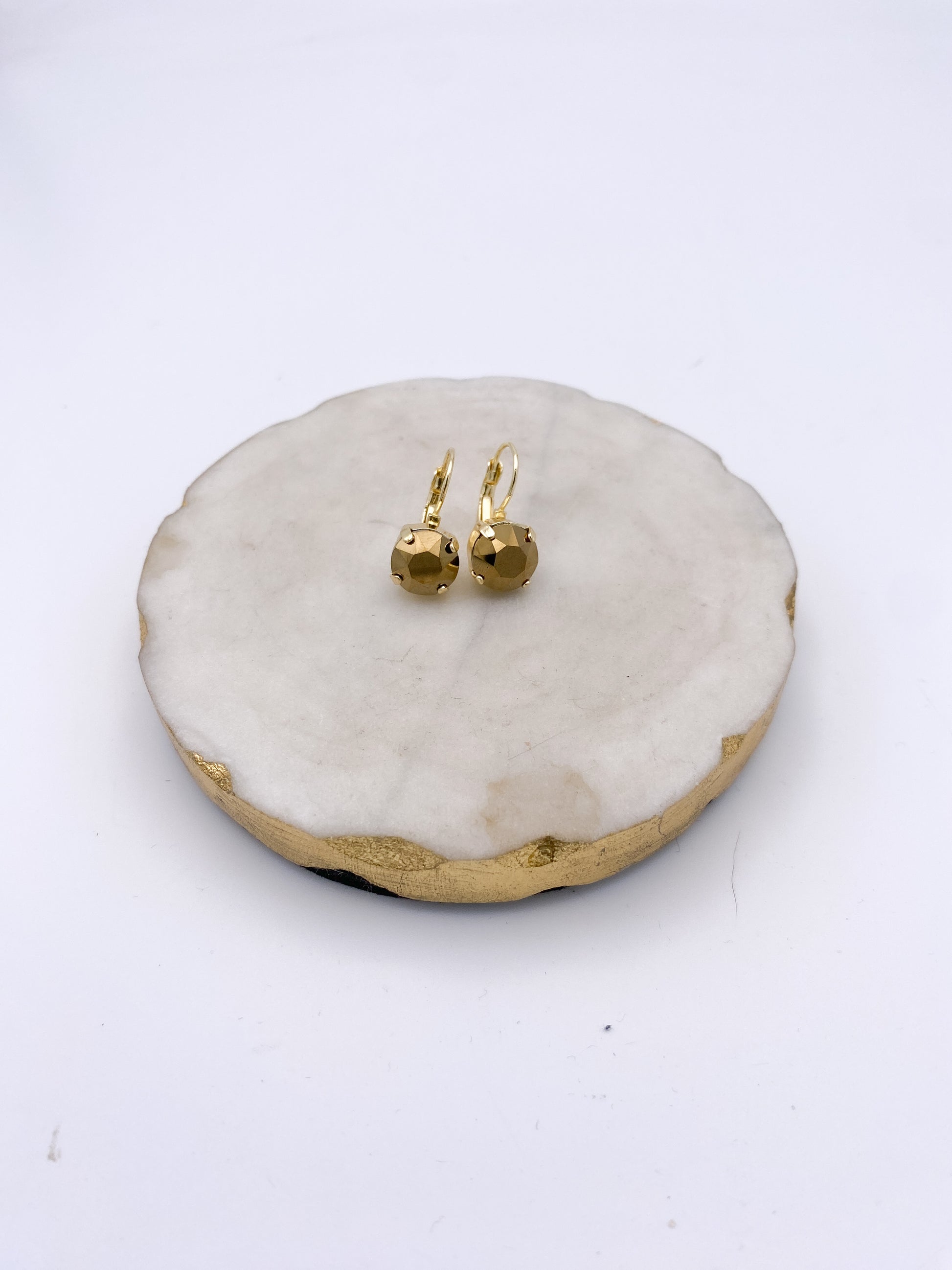 Gold lever-back drop earrings with faceted tiramisu bronze crystal stones in prong settings by AF Designs.