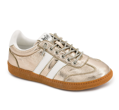 Corky's gold metallic low-top sneaker with white racing stripes, silver laces, and caramel gum sole