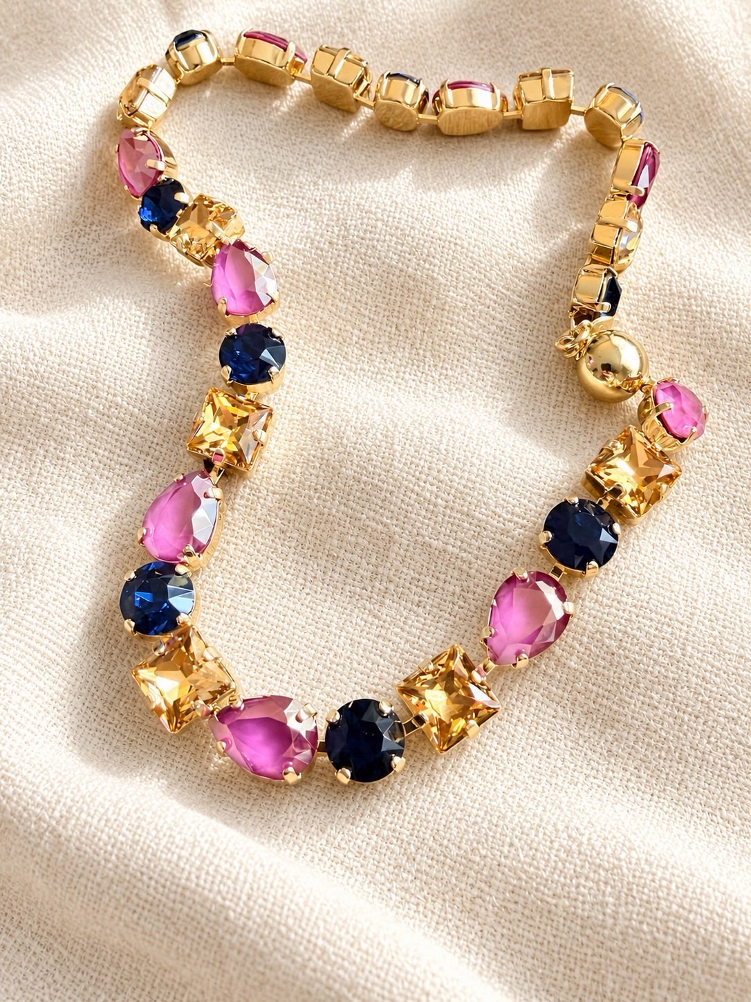 AF Designs Flirt Alert Statement Necklace with pink, navy, and champagne crystals in gold-tone settings