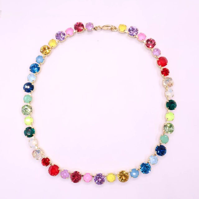 Colorful crystal necklace with multi-colored round stones in gold settings by BEHROZ