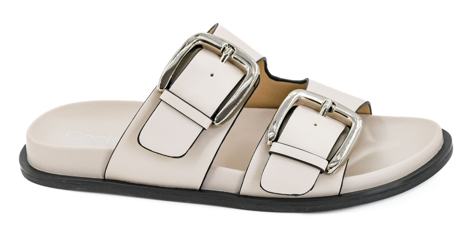Corky's ivory leather slide sandals with dual silver buckle straps and flat sole
