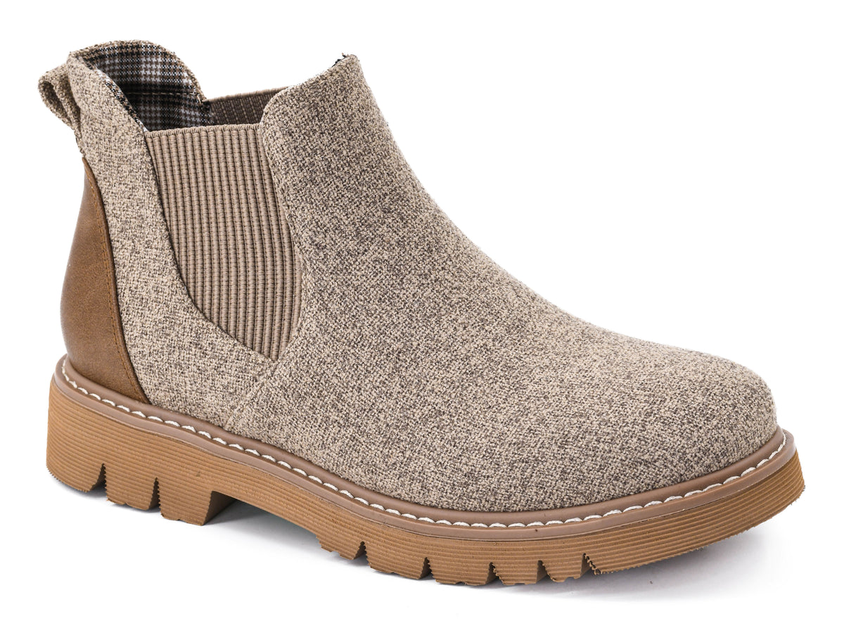 Side view of the sand combo Corky's It's Chilly Chelsea boot with stretch side panel, pull tab, plaid lining and tan lug sole
