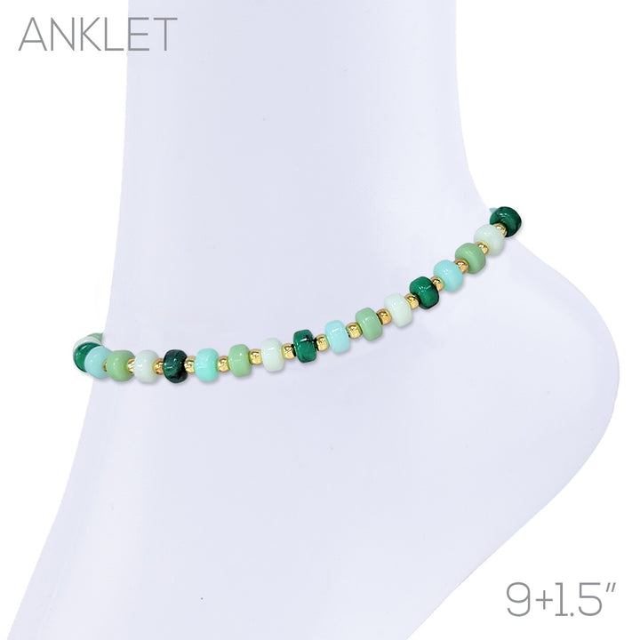 Beaded anklet with mint, aqua, emerald, and gold rondelle beads on white mannequin ankle, 9+1.5 inch length