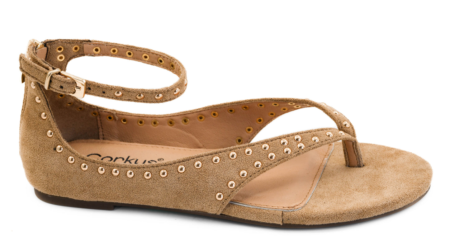 Camel faux suede flat sandals with gold studs, toe-loop design and ankle strap by Corky's